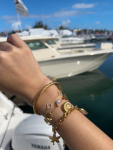 Load image into Gallery viewer, Twist Gold Bangle

